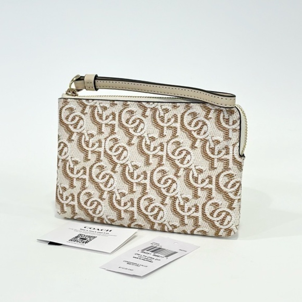 COACH CORNER ZIP WRISTLET WALLET WITH SIGNATURE MONOGRAM PRINT IN CHALK